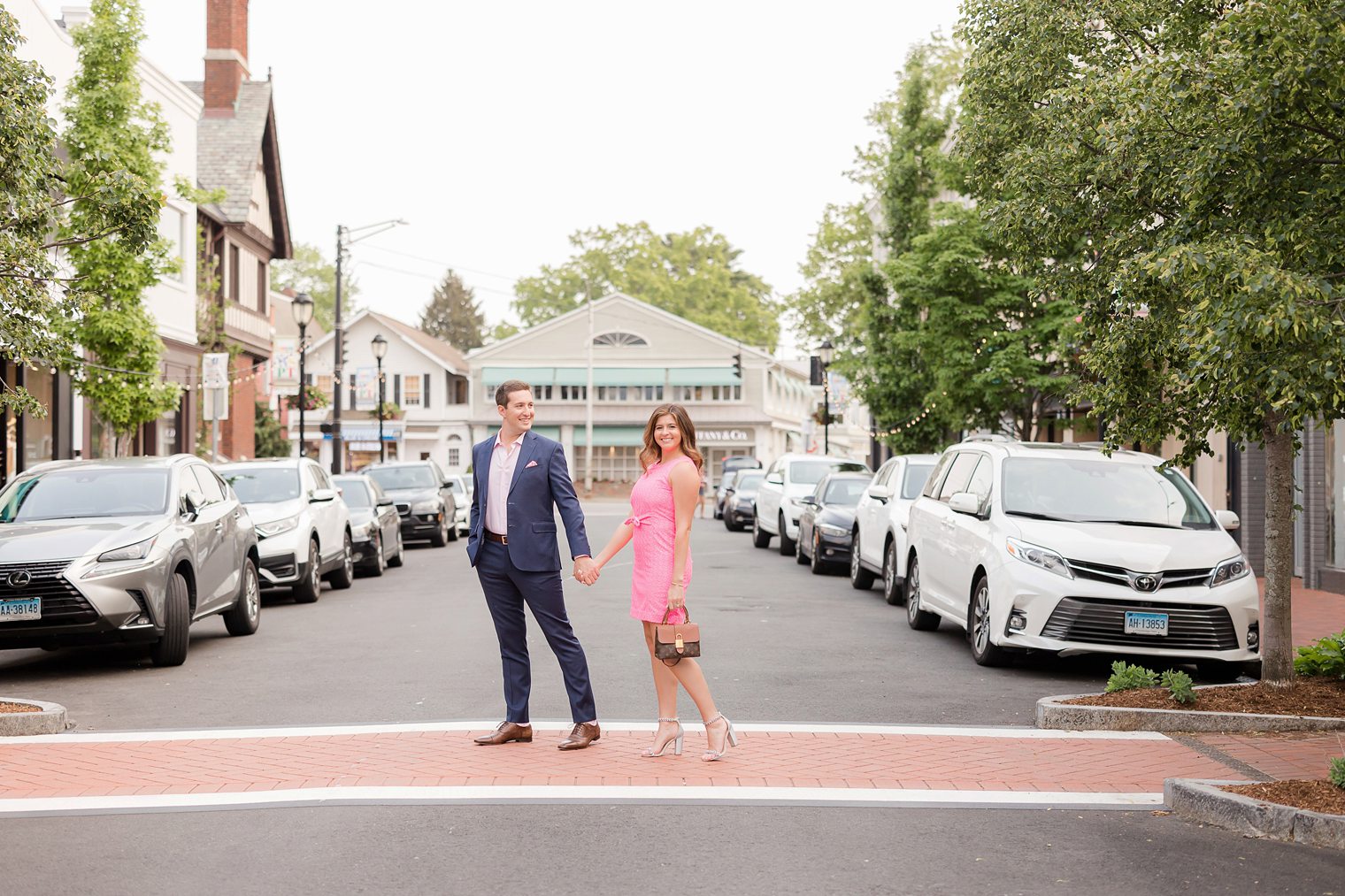 beautiful couple posing, enjoying their engagement session at Westport Connecticut