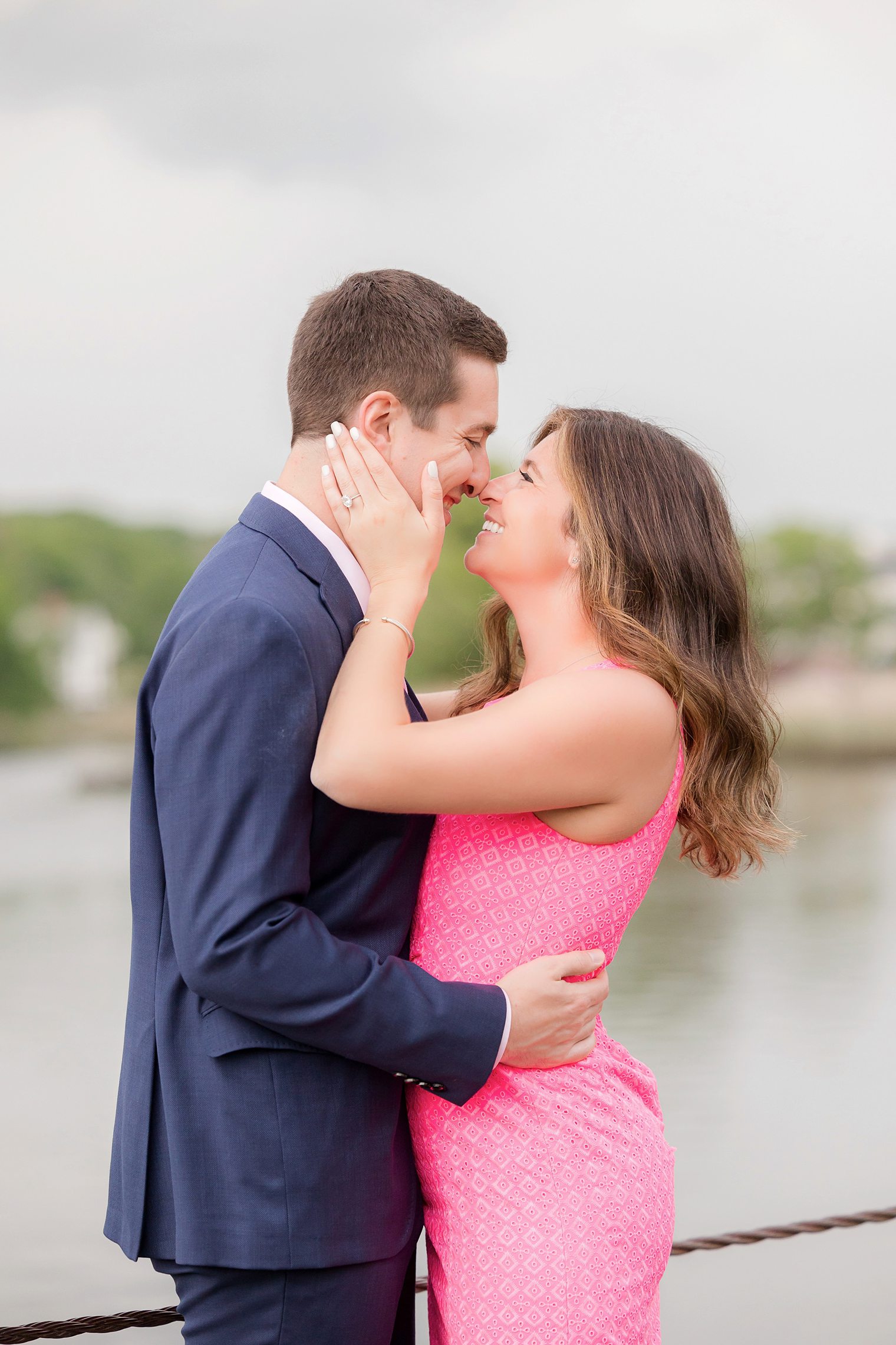 bride and fiancé smiling to each other 