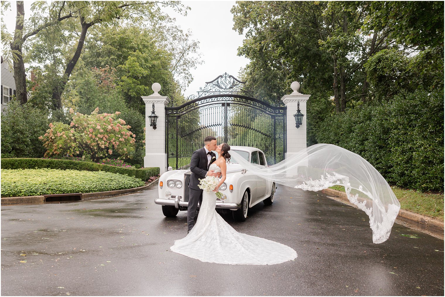 Husband and Wife sharing a kiss in their wedding day 