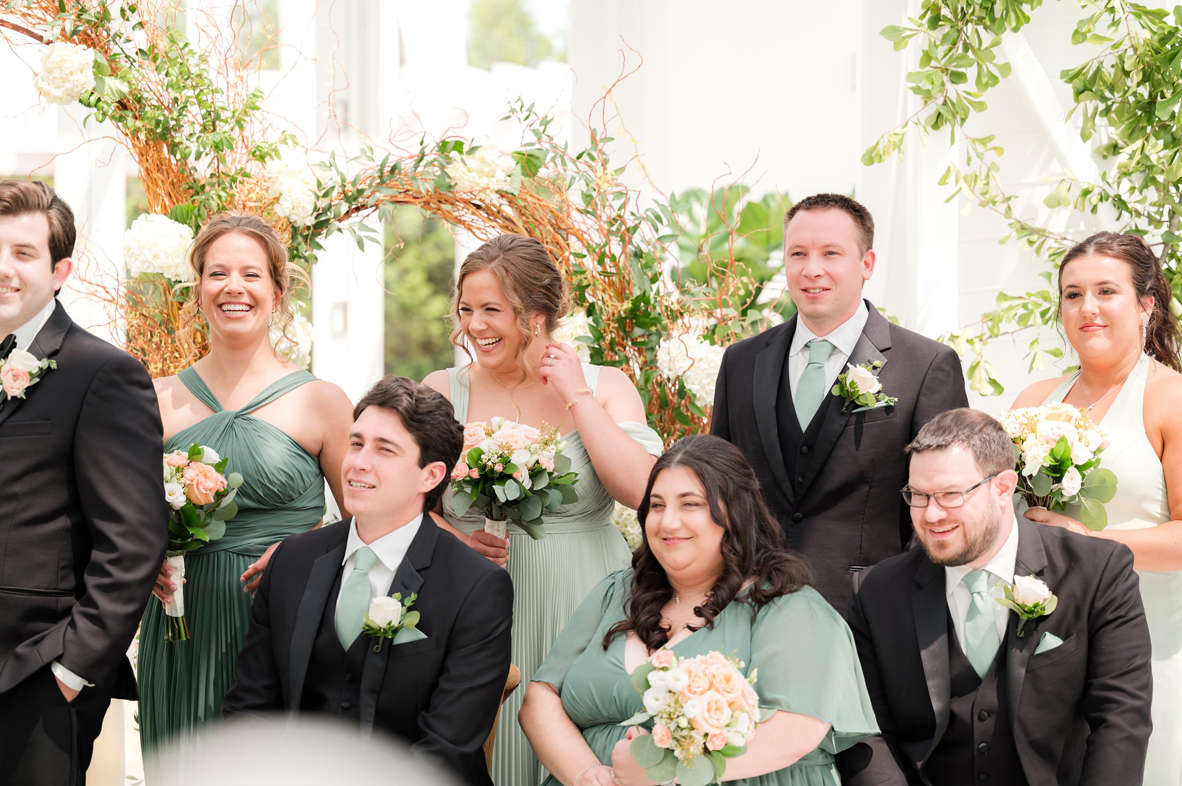 Wedding party looking at each other