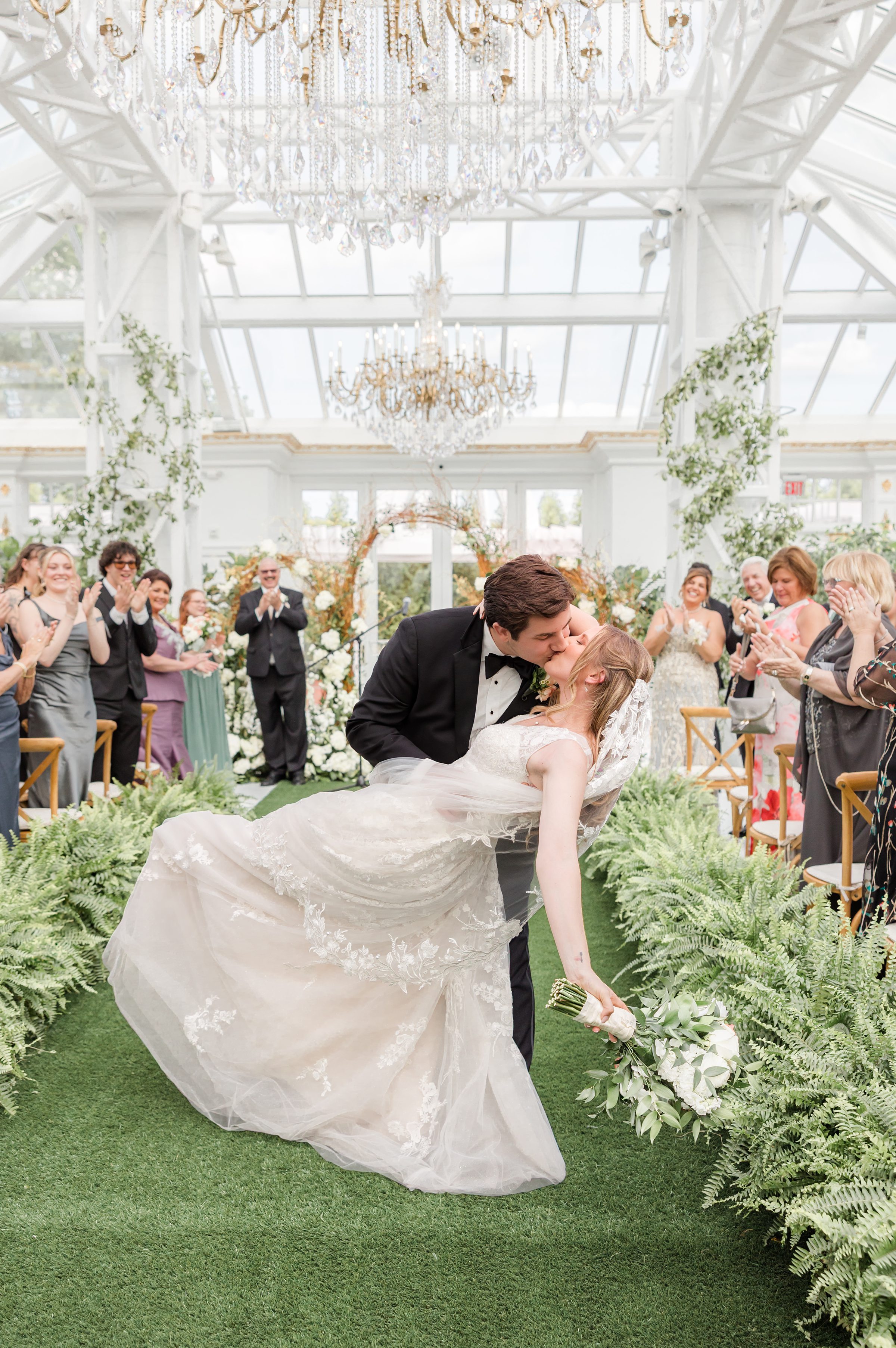 Bride and groom ceremony kiss