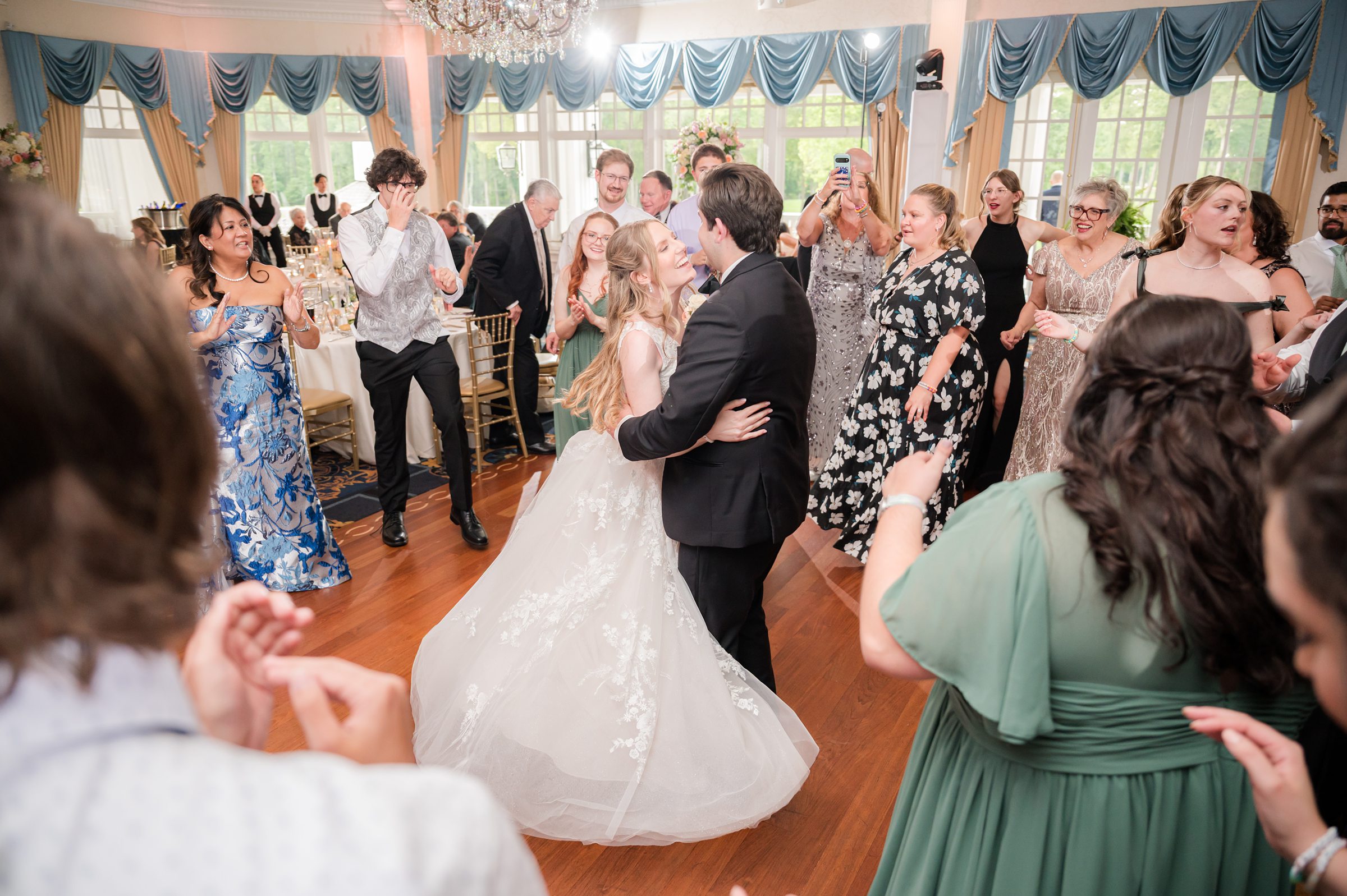 Bride and groom dancing and having fun