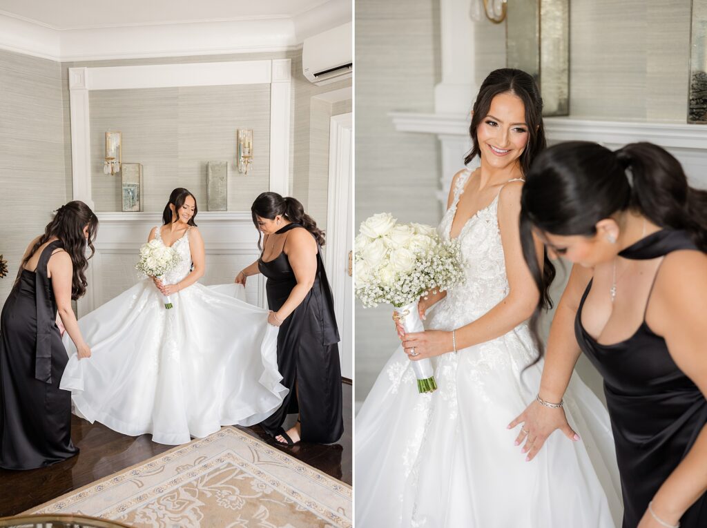Bridesmaids are helping the bride fix her wedding gown, while the bride is holding the flower bouquet 