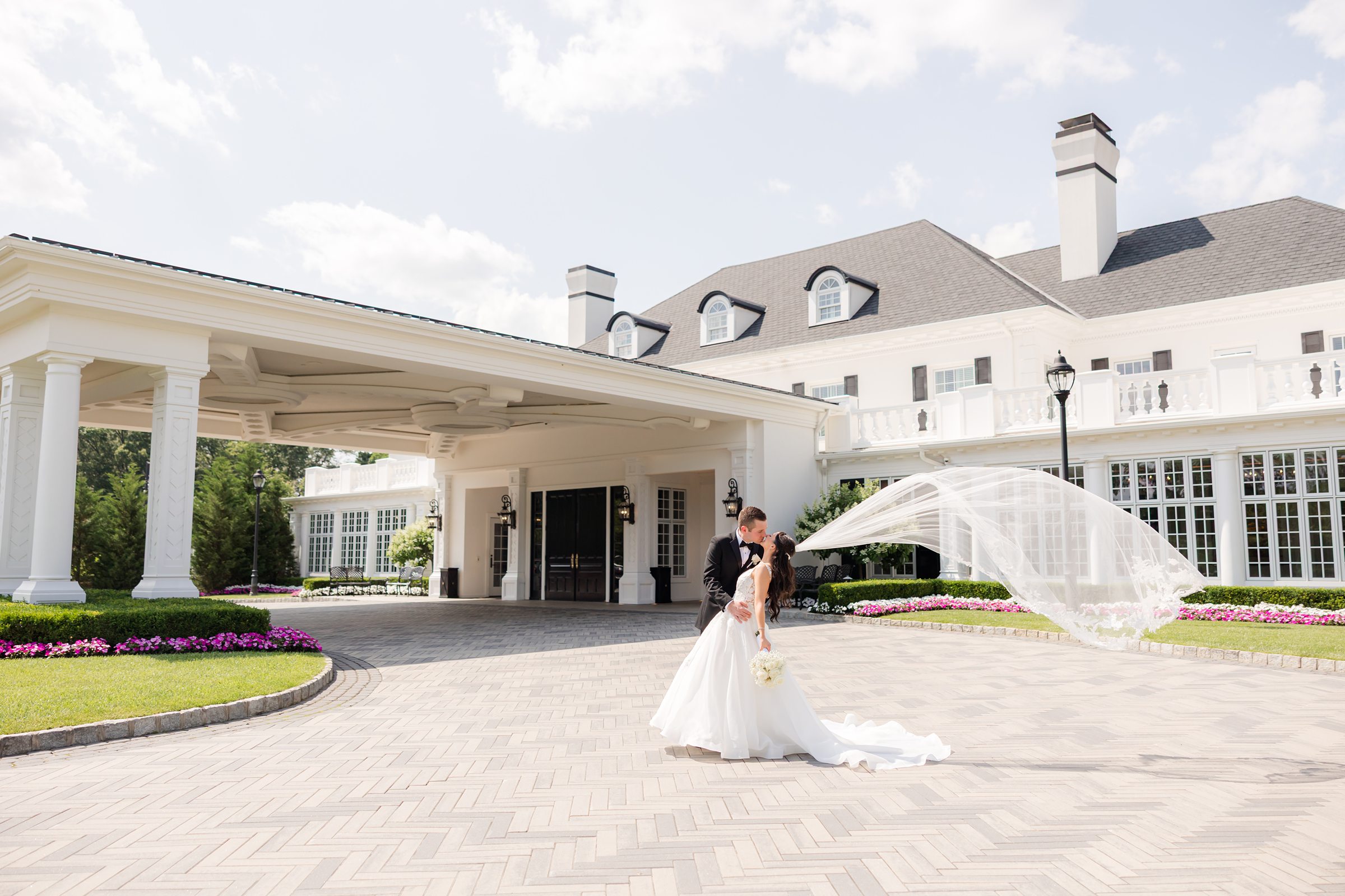 A shot of the couple kissing at Shadowbrook 