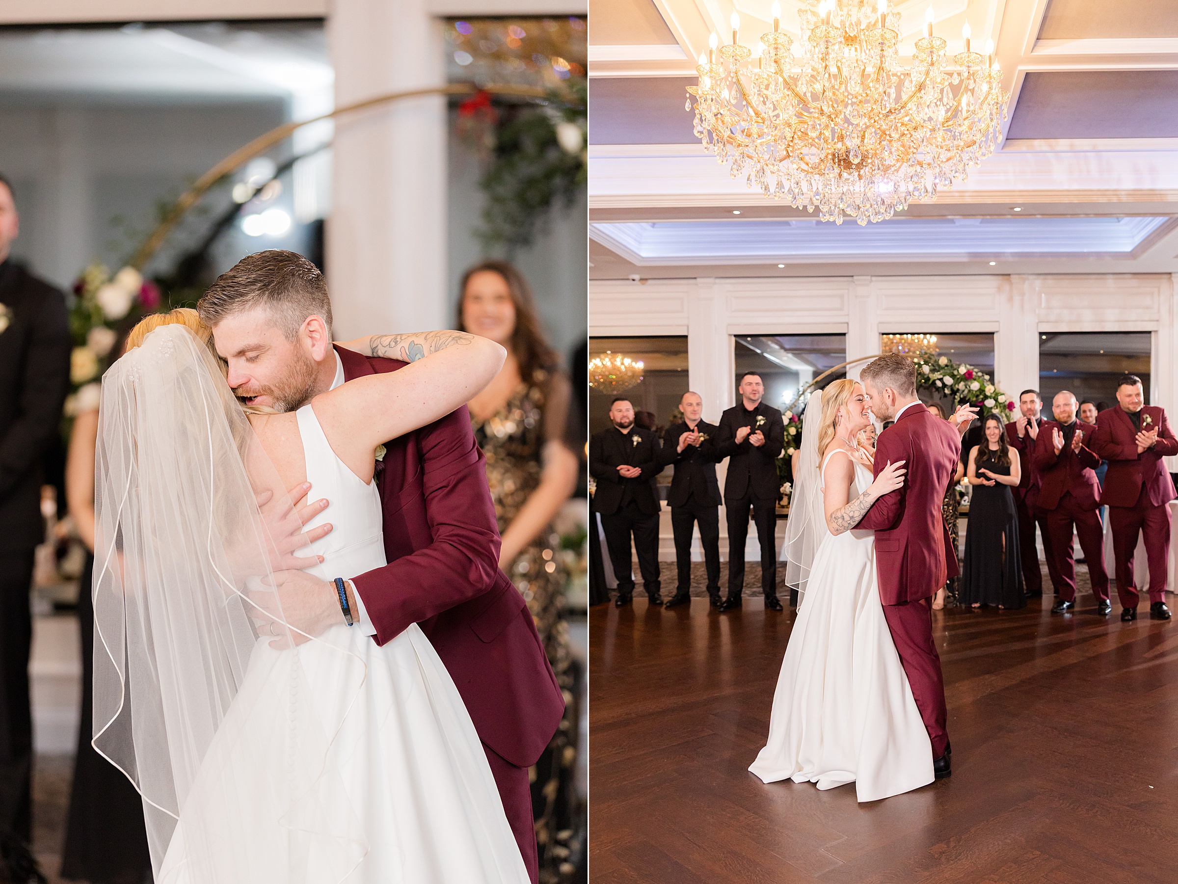 Bride and groom sharing a romantic embrace and kiss during their first dance, surrounded by guests in a warmly lit ballroom.