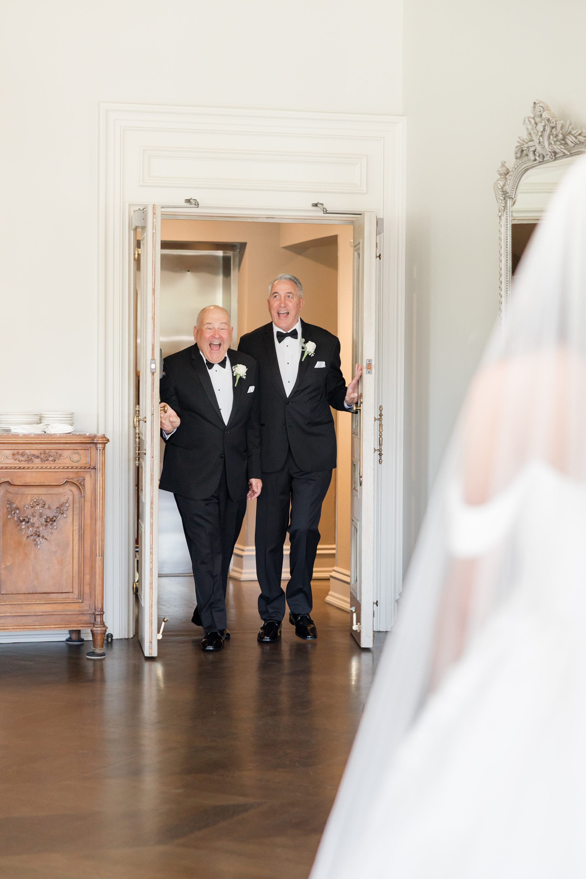 bride's first look with her Dad and Step-dad