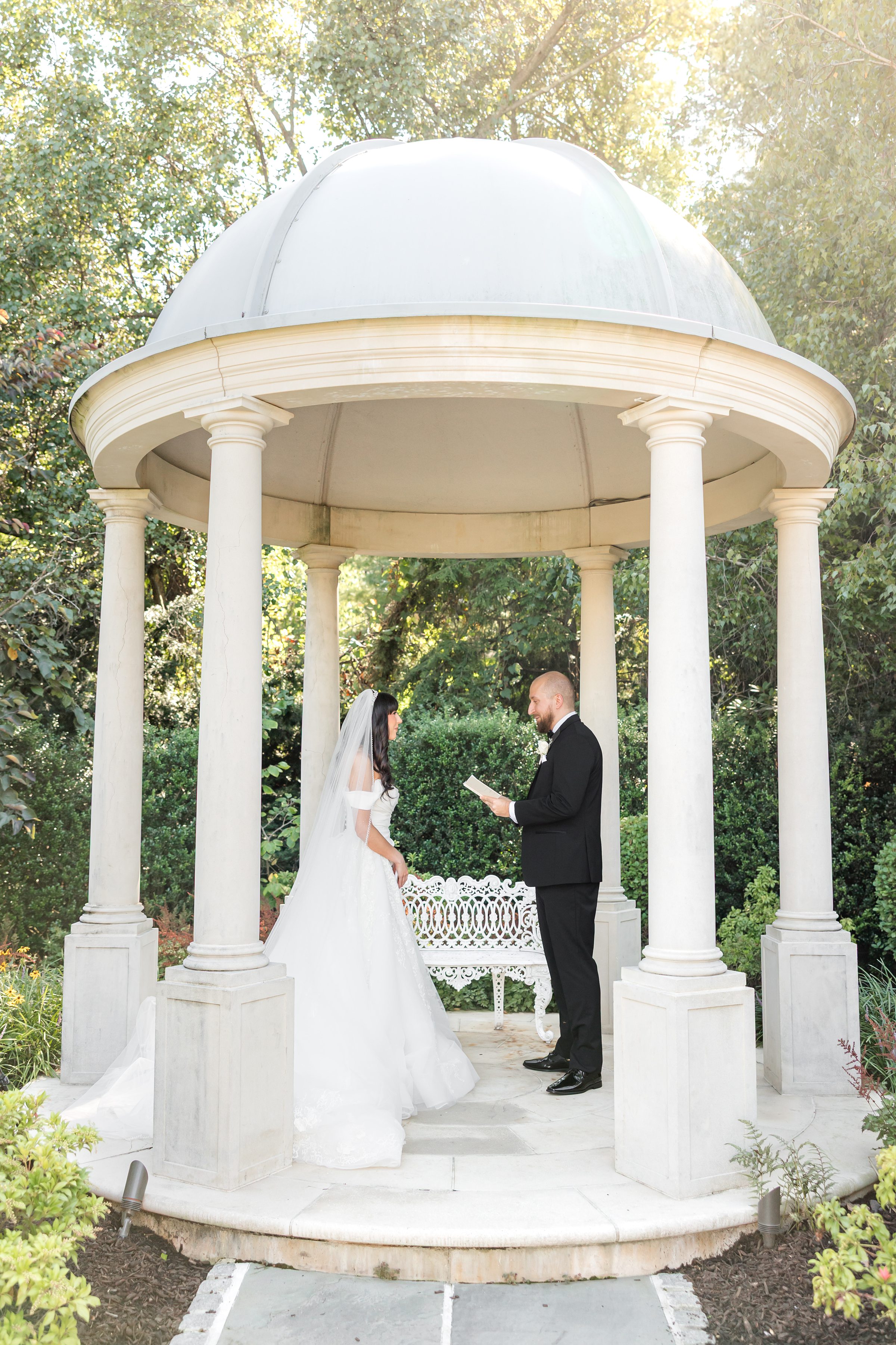 photo of groom and bride, groom saying his vows to bride 