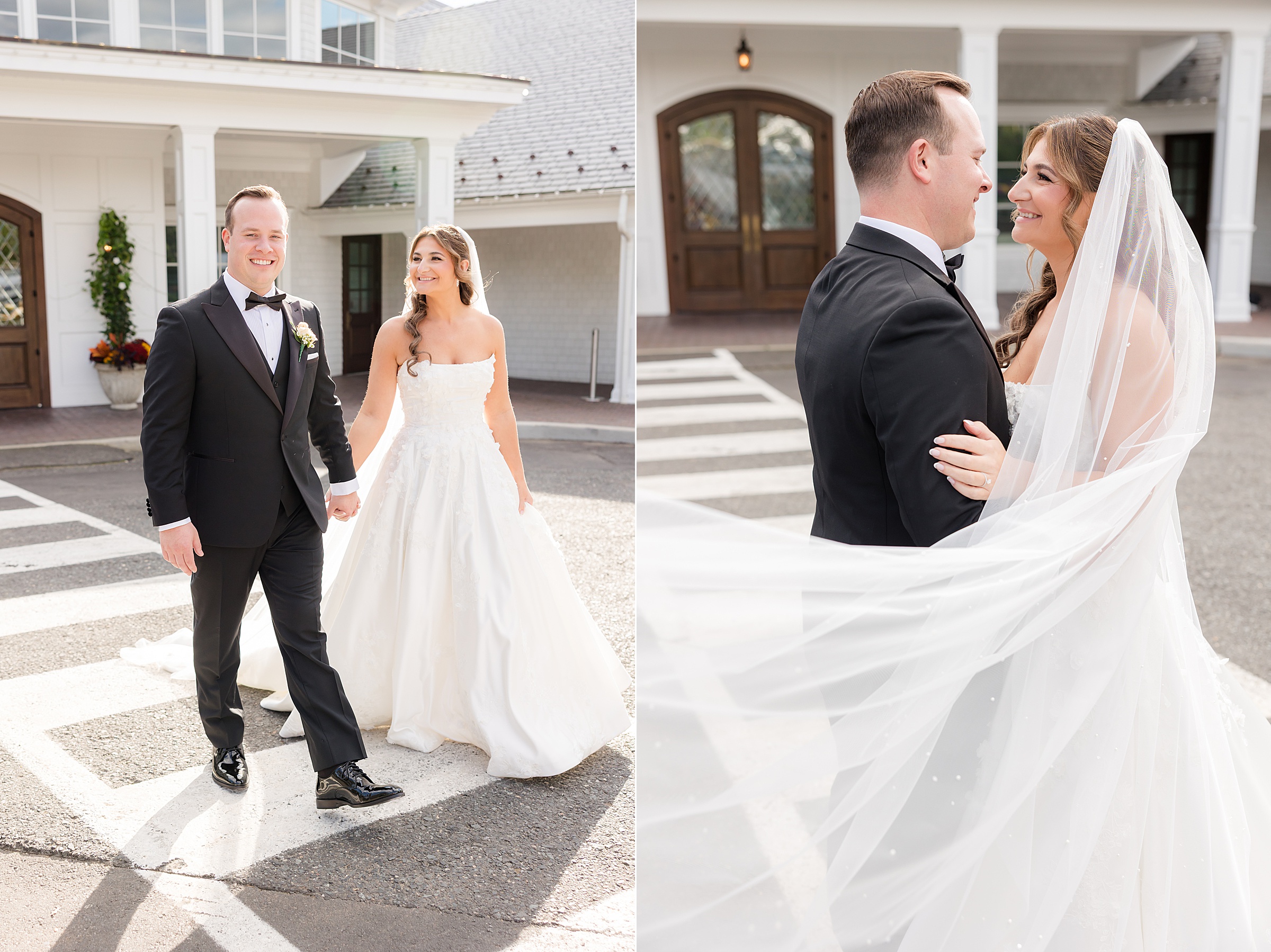 Bride and groom standing close together with veil blowing softly, sharing a smile.