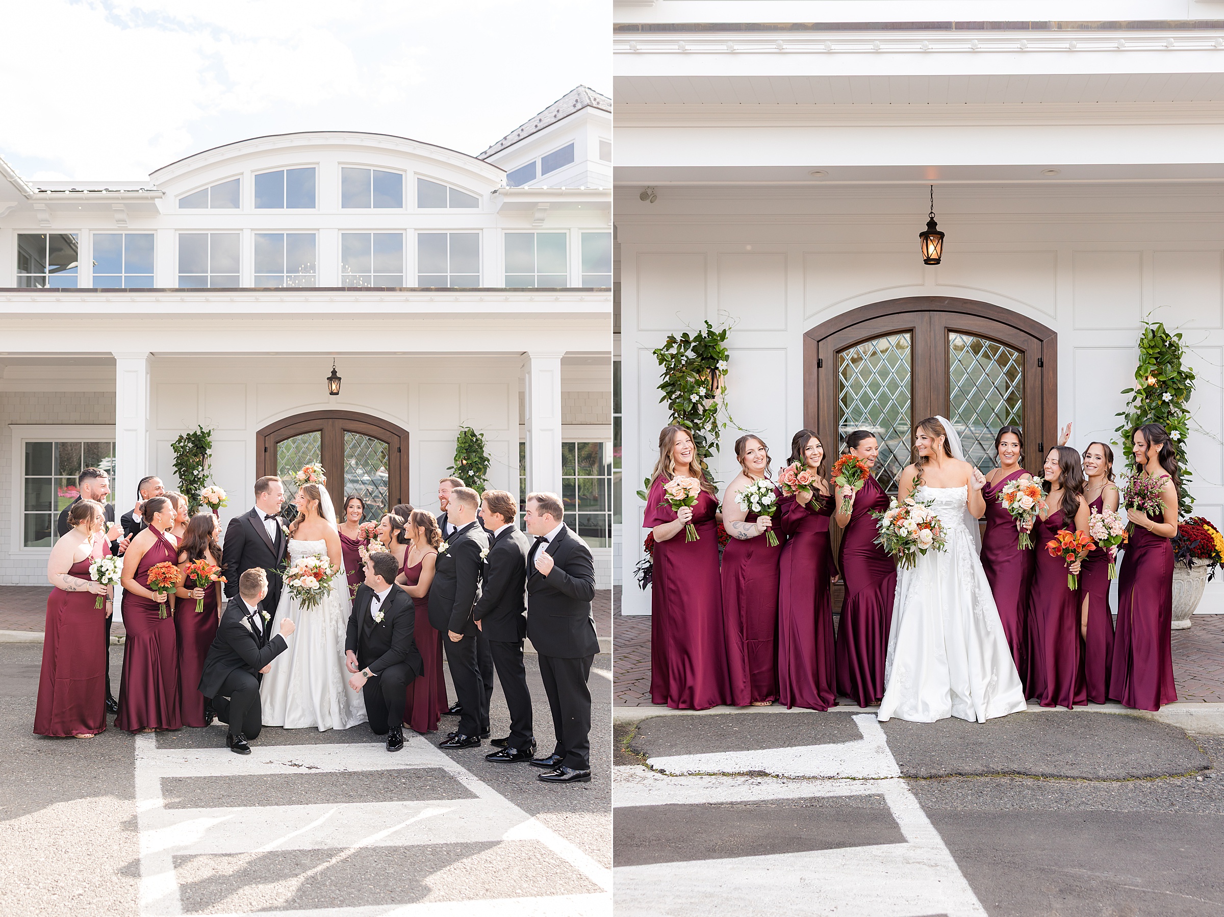 Wedding party celebrating outside a white venue, with the bride and groom surrounded by bridesmaids in burgundy dresses and groomsmen in black suits, all smiling and laughing together.