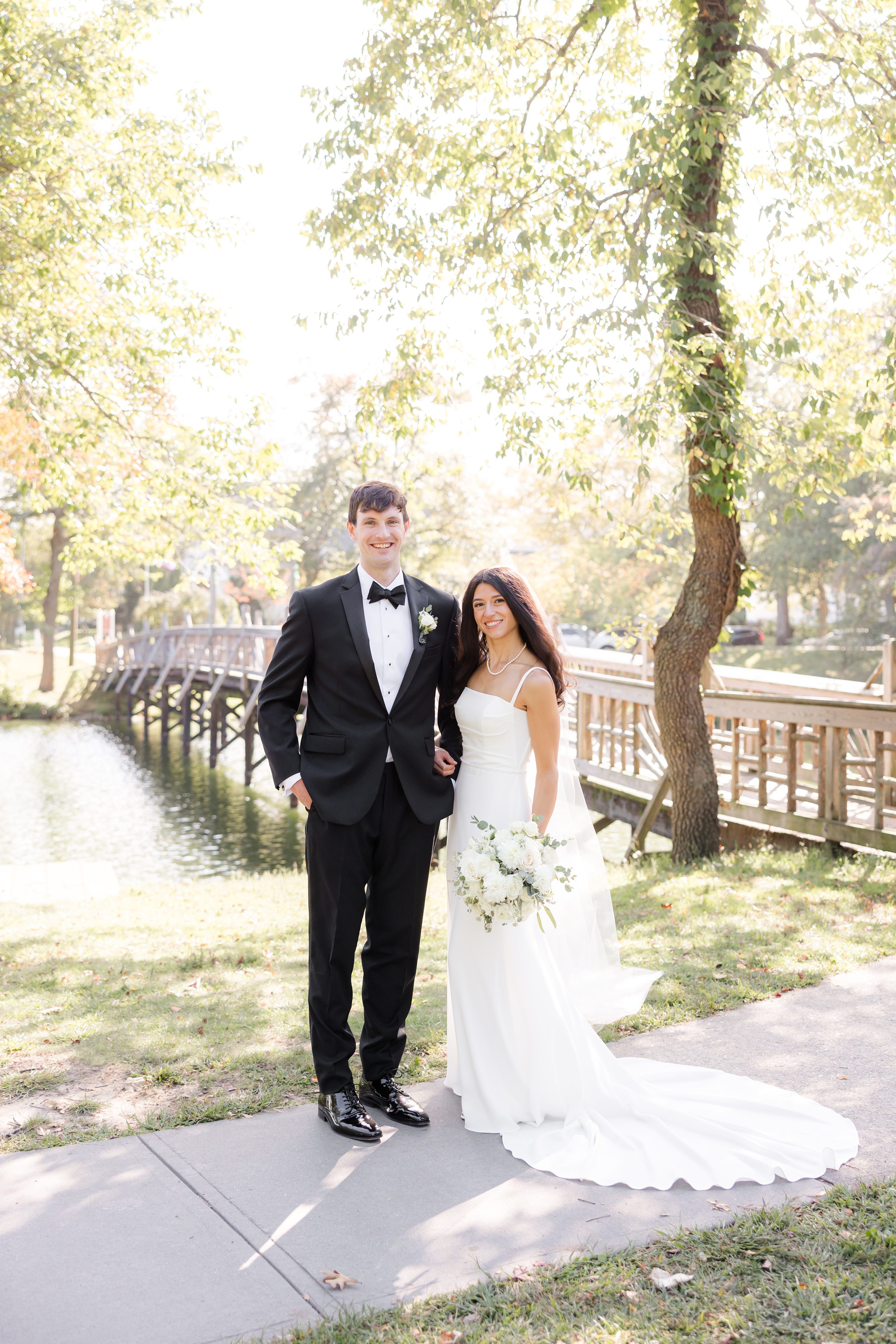 Together in perfect harmony, the bride and groom stands surrounded by nature, beginning their lifelong journey.