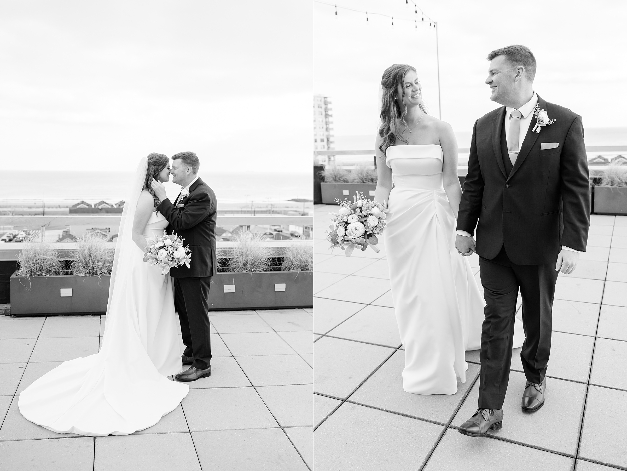 Bride and groom embracing with ocean view and walking together holding hands on rooftop.