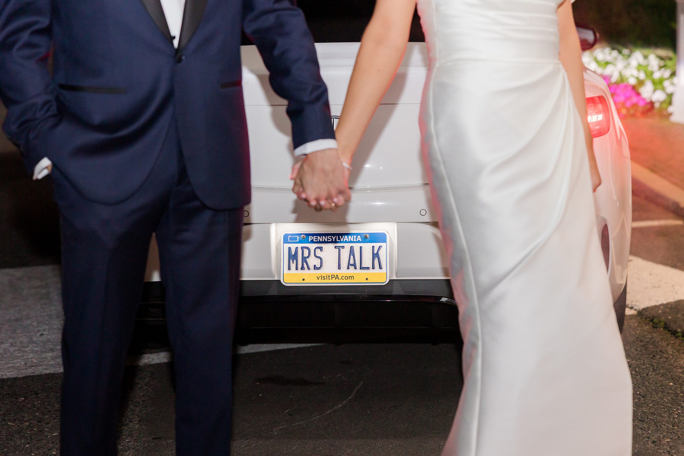 Newlyweds share a quiet, romantic moment before departing into their new life together.