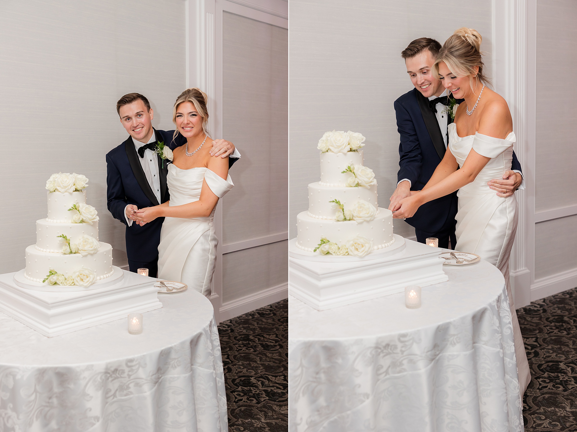 Bride and groom stands close behind their elegant wedding cake, hands joined as they prepare to cut it, radiating happiness and excitement.