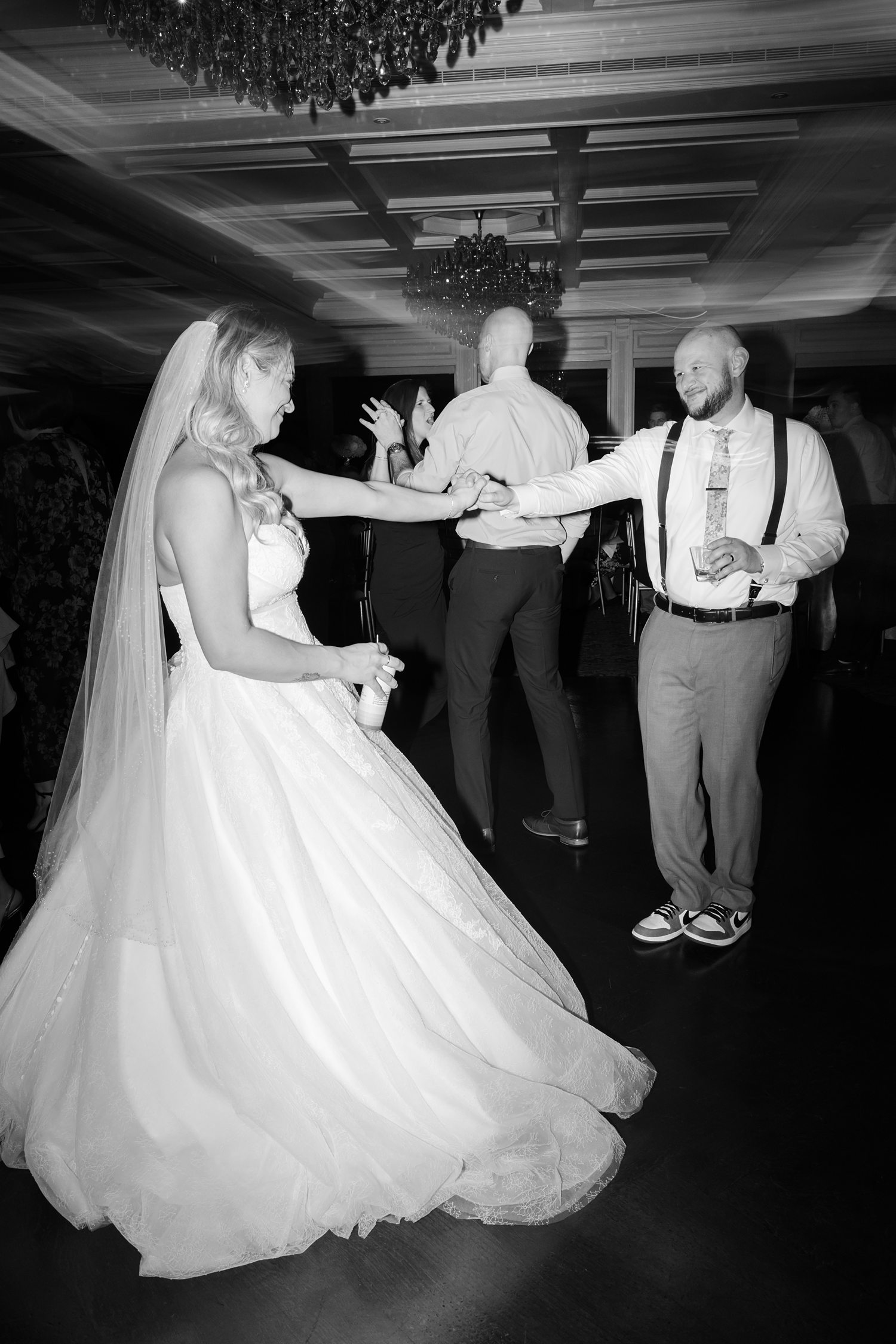 Black and white wedding dance floor moment with bride and groom