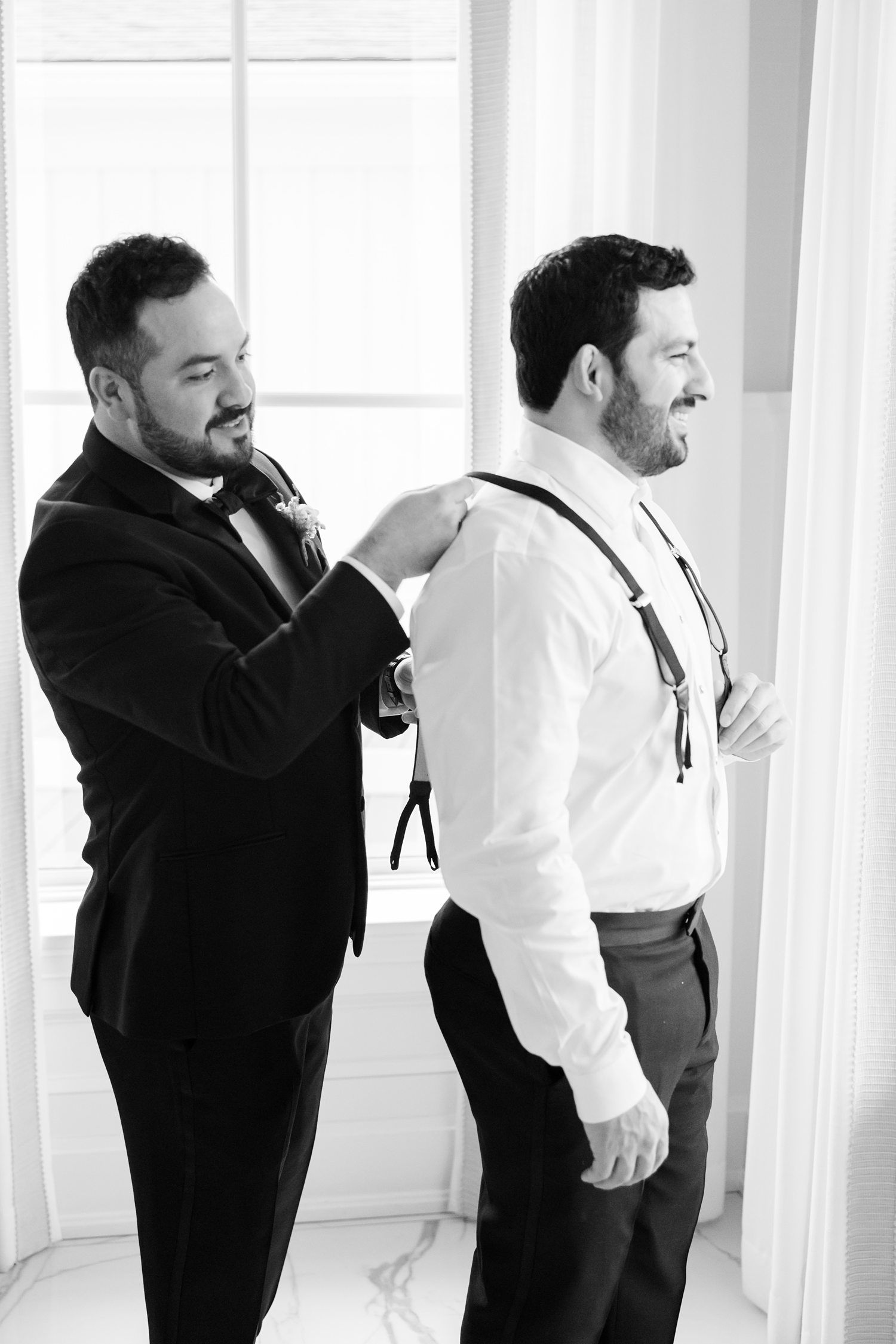 Groom getting ready with his groomsman 