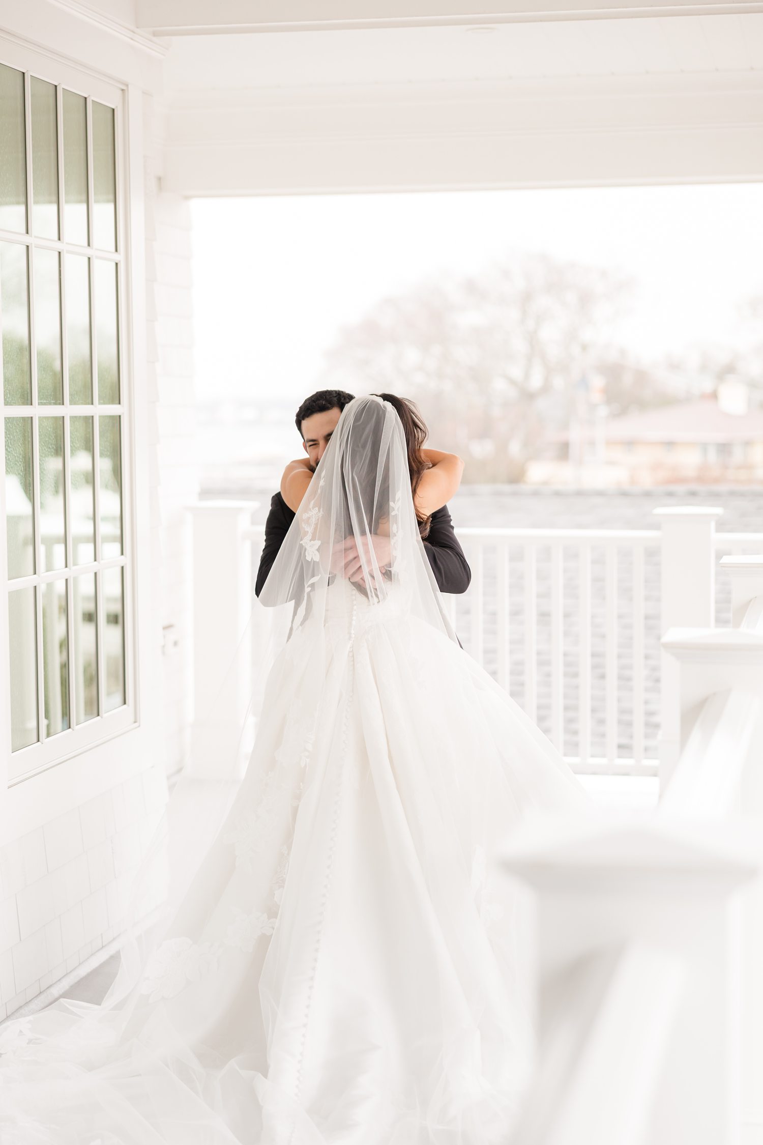 Bride and groom's embrace during their first look 