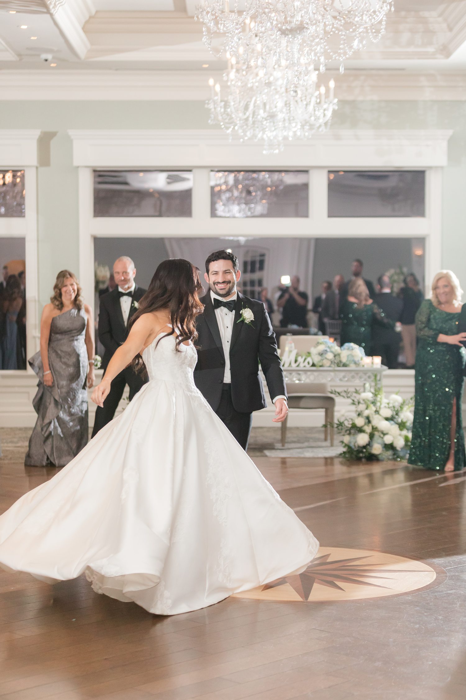 Bride and groom dancing together during the reception