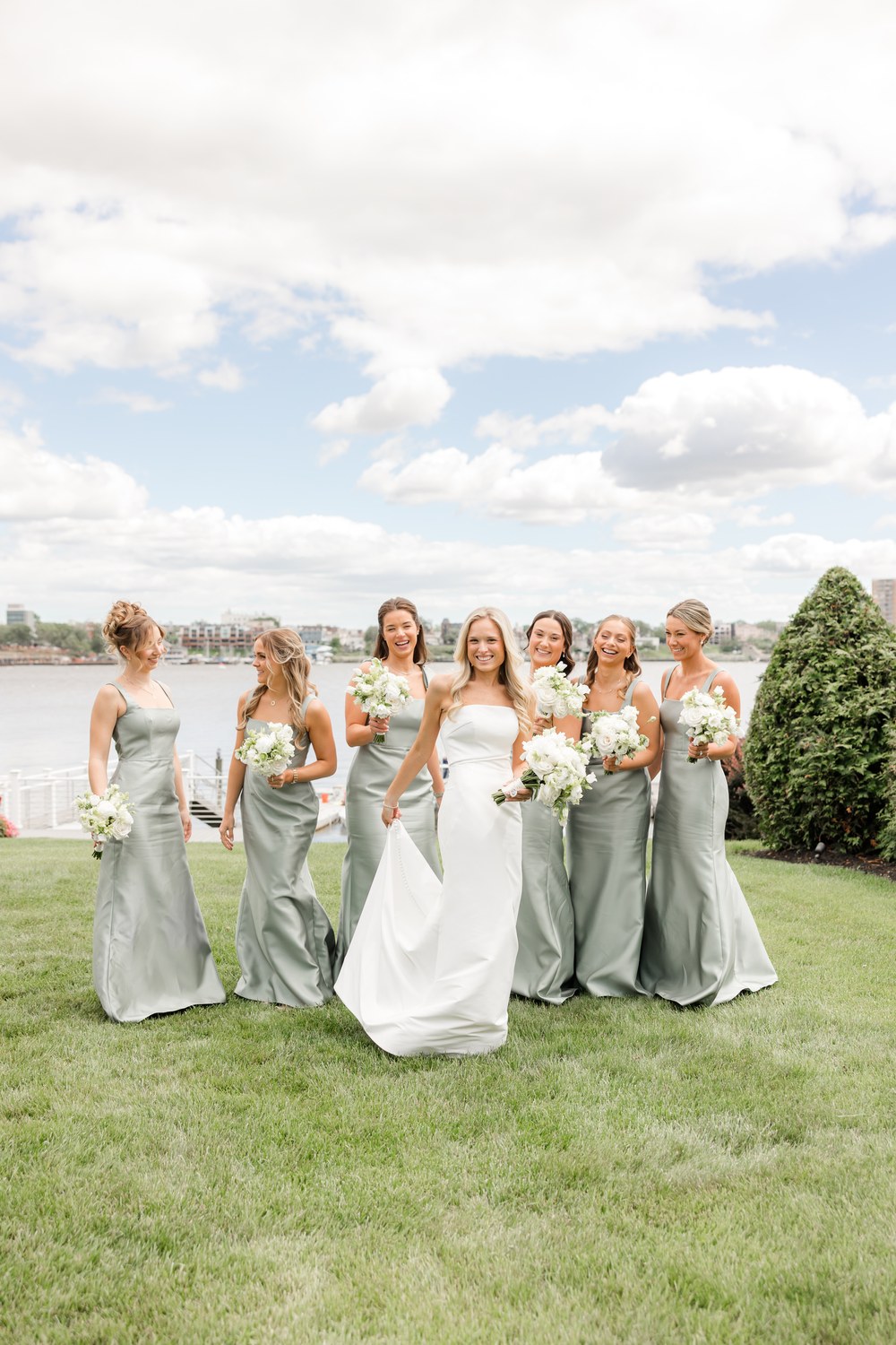 Bridesmaids in sage green dresses