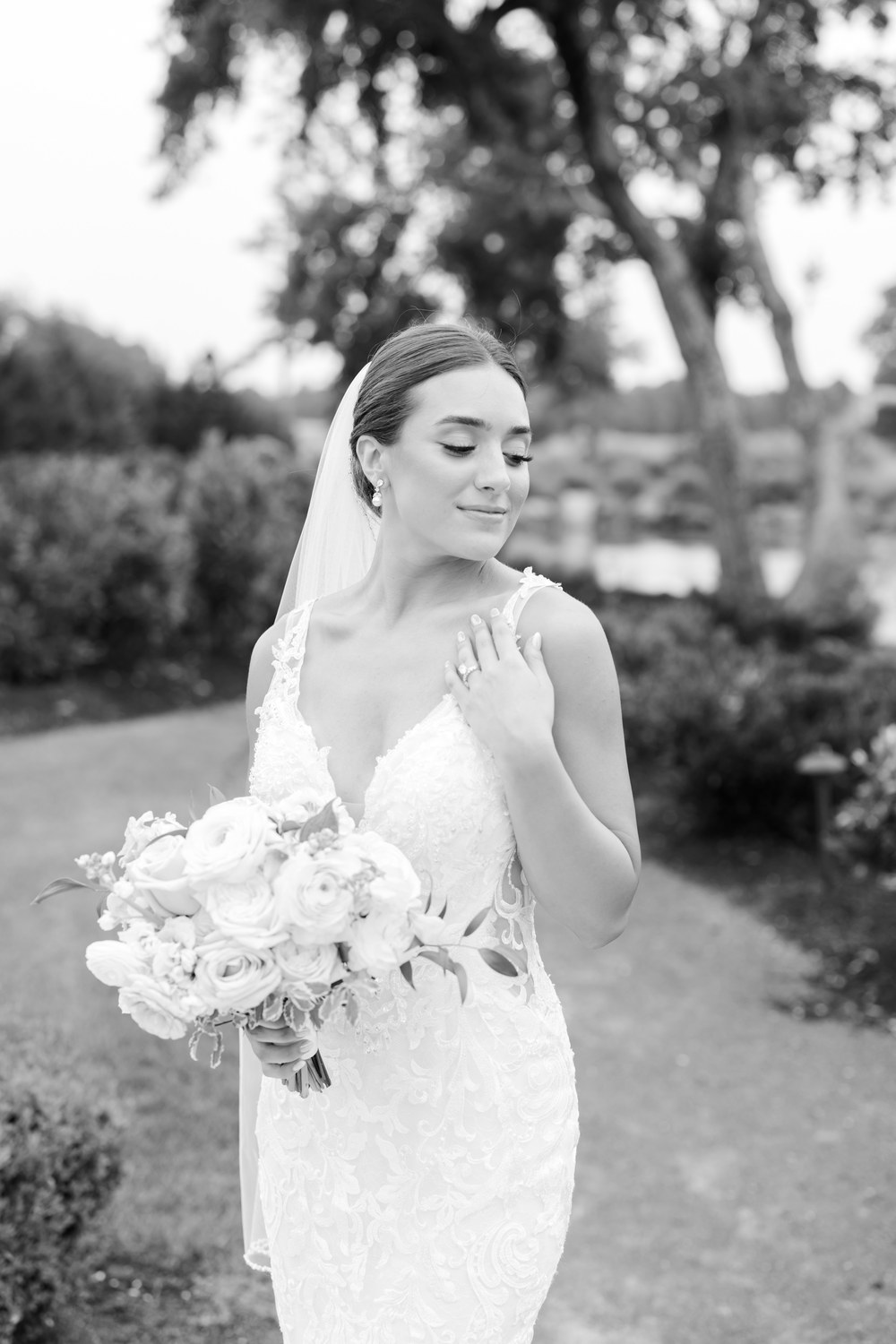 Black and white bridal portrait with bouquet
