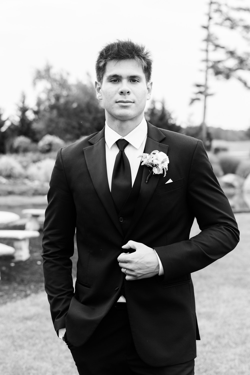 Black and white portrait of the groom at Renault Winery