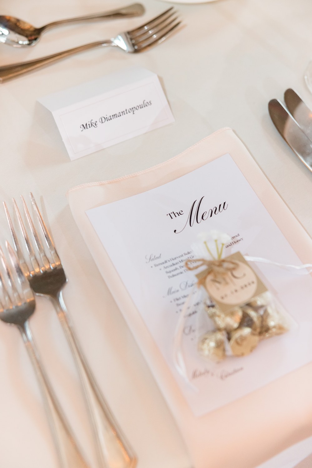 Wedding place setting with menu and favor at Renault Winery